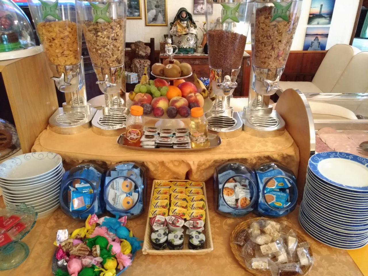Hotel Abbaruja Olbia Bagian luar foto